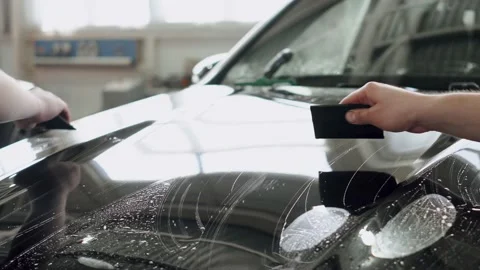 Thin polyurethane film or polymer as protective skin from scratches and rock Stock Footage 150918135