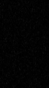 Thin rain streaks fall over a deep black background, delivering a moody cin.. Ilustração Stock