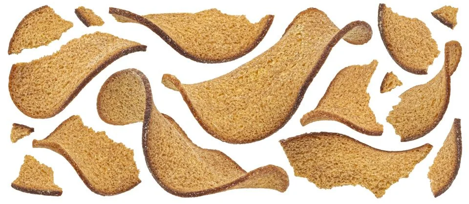 Thin rye bread croutons isolated on white background, full depth of field Foto stock