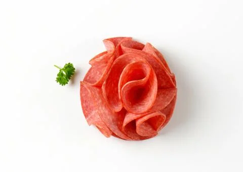 Thin salami slices Stock Photos