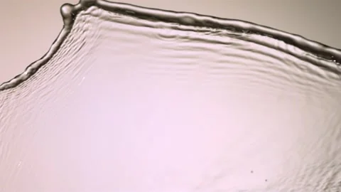 Thin sheet of clear water moving ac Stock Footage 326031191