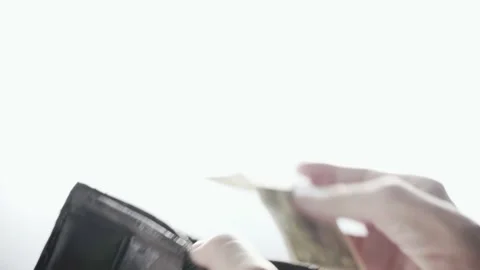 Thin Sick Hand Puts One Dollar In An Old Wallet On A White Background. Stock Footage 151398016