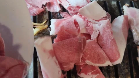 Thin Sliced Beef Brisket Ready To Cook In Korean BBQ Restaurant Stock Footage 317774330