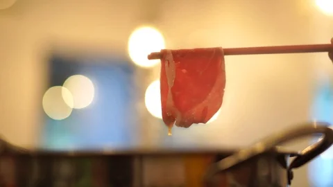 Thin sliced beef with steamed pot for shabu or suki Stock-Footage 106718514