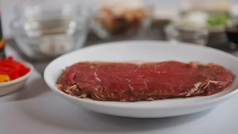 Thin sliced smoked beef for kebab Stock Footage 130398993