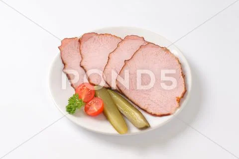 Thin sliced smoked pork meat Stock Photos