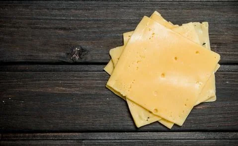 Thin slices of cheese. Stock Photos