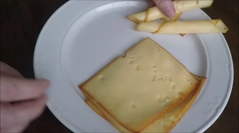 Thin slices of fresh cheese Stock Footage 46046334