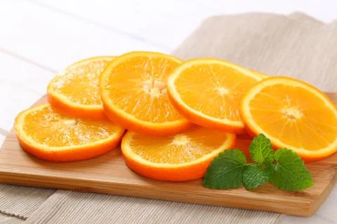 Thin slices of fresh orange Stock Photos