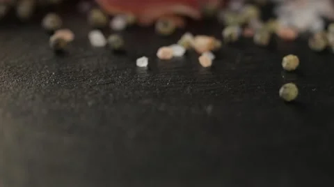 Thin slices of pork ham on the wood plate. Dolly shot. Closeup Видео 68333323