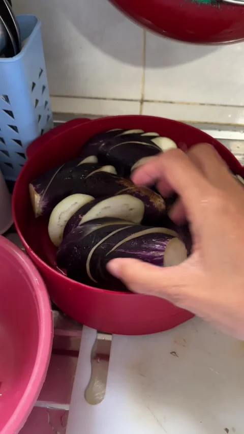 Thin slices of purple eggplant Stock Footage 296455243