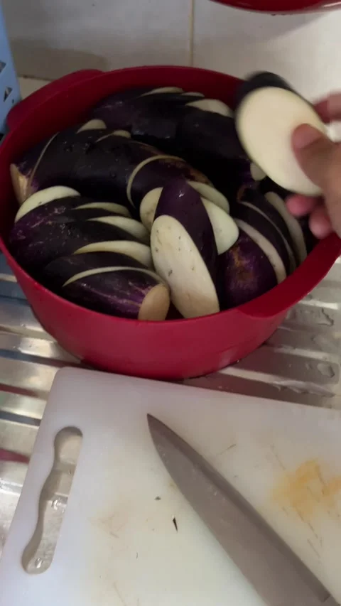 Thin slices of purple eggplant Stock Footage 296455382