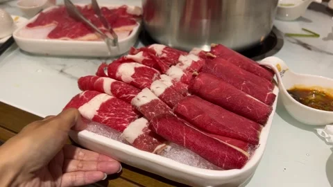 Thin Slices of Raw Beef for Hot Pot Asian Food 스톡 동영상 253842301