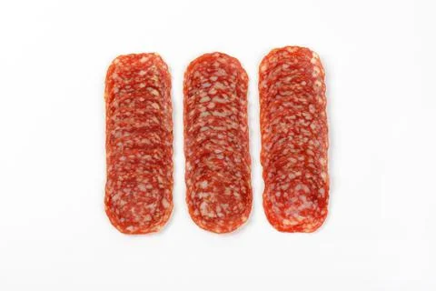 Thin slices of salami Stock Photos