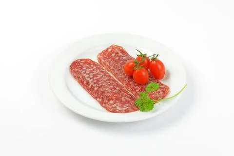 Thin slices of salami Stock Photos