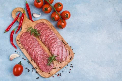 Thin slices of salami Stock Photos