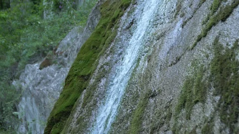  Thin Stream of Water Flows Down the Stone Stock Footage 105263341