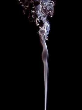 A thin stream of white smoke rises gently upwards Stock Photos