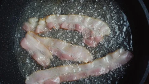 Thin Striped Bacon Fries On A Pan 動画素材 122191132