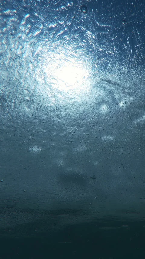 Thin translucent ice with frozen inside tiny air bubbles floats towards us, Stock Footage 332855379