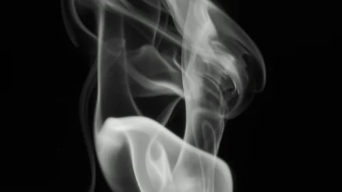 Thin trickle of gray smoke rising graceful twists upward. Stock Footage 106316475
