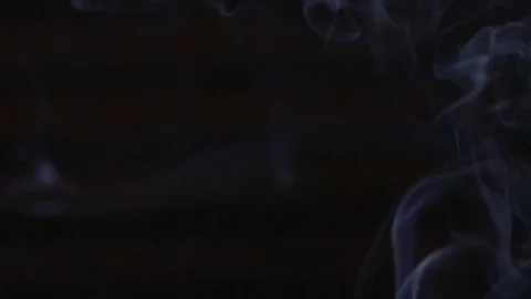 Thin trickle of smoke from the aroma-stick. Smell of an aromatic stick Stock Footage 77806841