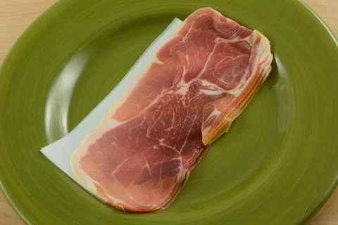 Thin uncooked prosciutto slices Foto stock