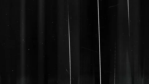 Thin vertical glitch lines with analog noise and film grain texture 動画素材 333415985