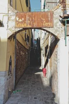 Thin walkway between buildings Stock Photos