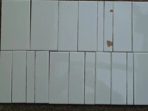 Thin white tile pieces Stock Photos