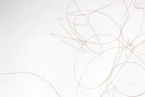 Thin wire on white background . Stock Photos