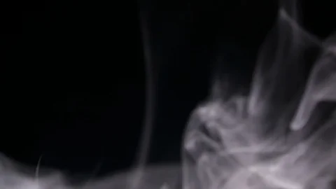 Thin, wispy, white smoke or vapor on black background rising from bottom Stock Footage 108279965