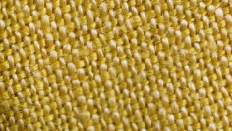 Thin yellow linen fabric. Real time, close-up, camera movement, braided texture, Stock Footage 129147402