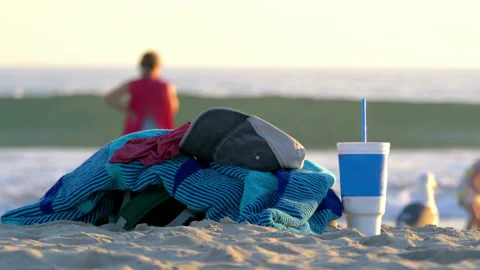 Things left on the beach in 4k slow motion 60fps Stock Footage 155810603