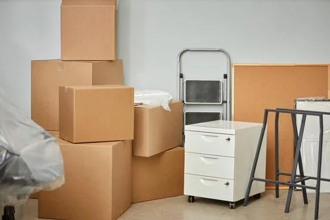 Things packing in cardboard containers for relocation Stock Photos