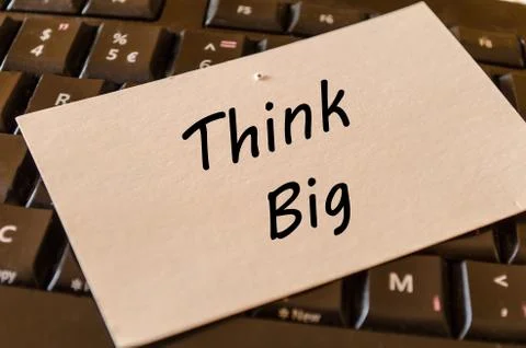 Think big concept on keyboard background Stock Photos