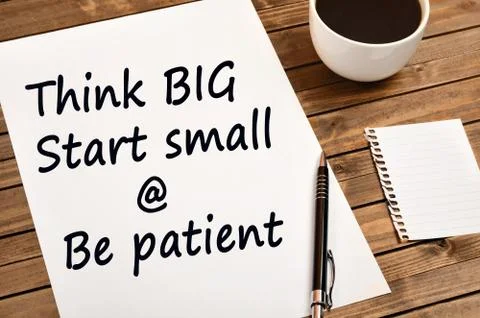 Think big Start small and Be patient Stock Photos