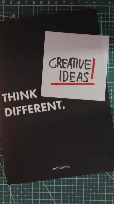 Think Different notebook with Creative Ideas paper note Stock Footage 341245992
