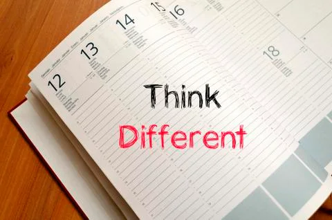 Think different text concept on notebook Stock Photos