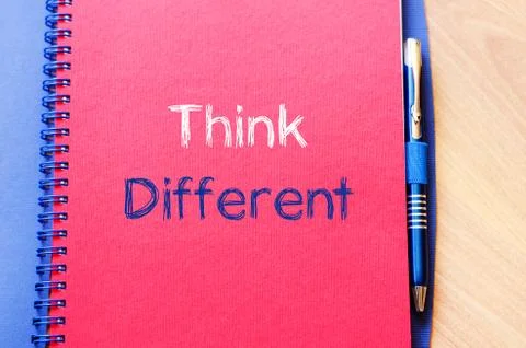 Think different text concept on notebook Stock Photos