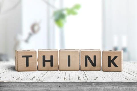 Think message sign on a worn table Stock Photos