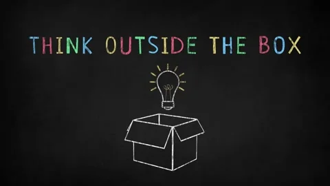 "Think outside the box" text written on chalkboard Stock Footage 135590244