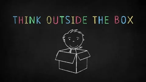 "Think outside the box" text written on chalkboard Stock Footage 135590264
