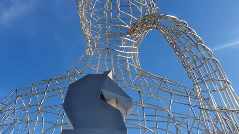 The thinker's monument with a chess piece in Dos Hermanas Stock Footage 224869556