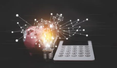 Thinking and creative concept, calculator with piggy bank and light bulb styl Stock Photos