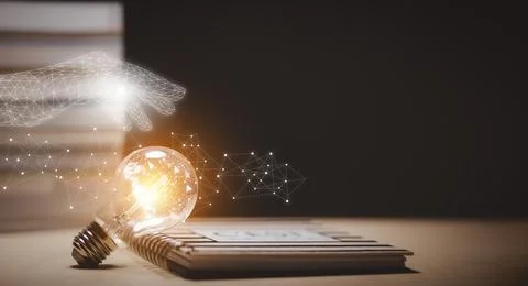 Thinking and creative concept, Light bulb on the Book and light bulb style bo Stock Photos