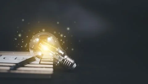 Thinking and creative concept, Light bulb on the Book and light bulb style bo Stock Photos