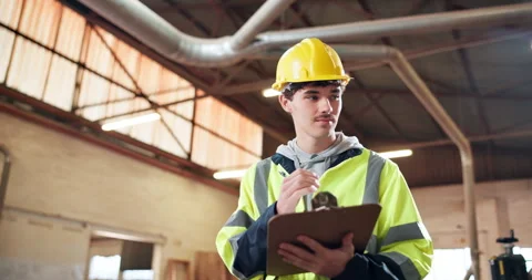 Thinking, architect and man with clipboard in building, safety check and Stock Footage 338104224