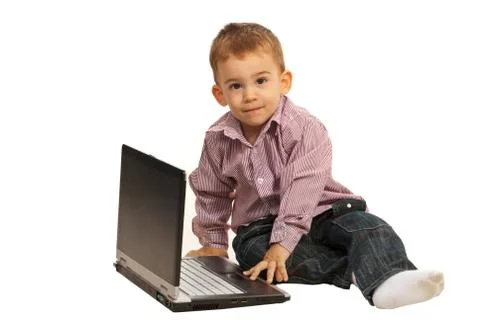 Thinking boy with laptop Foto stock