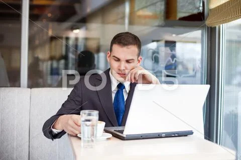 Thinking businessman on coffee break Stock Photos